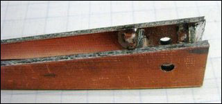 Figure 5. With the two blades soldered to the spacers, holes are drilled as strain reliefs for the test leads.